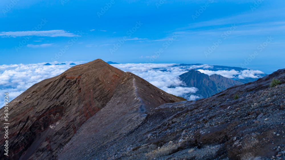 Sunrise at the top of the Ijen volcano. Panoramic view of East Java, Indonesia. The background of the natural landscape.