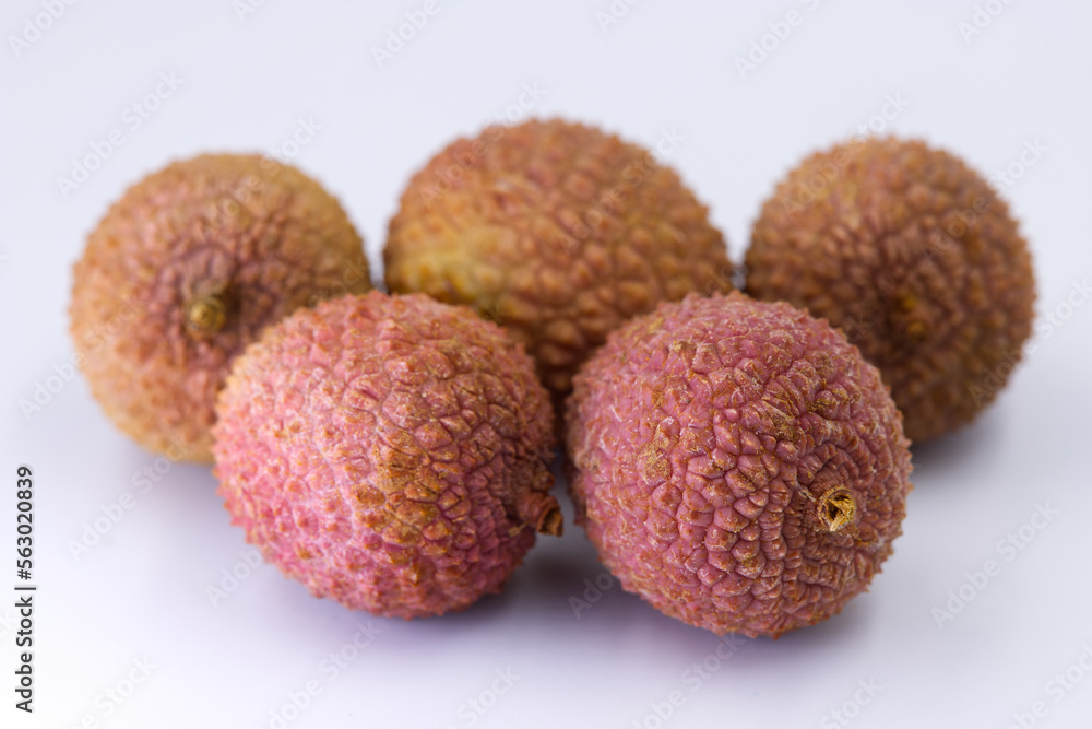 Lichi Fruits on white background. Close-up and selective focus. Lichi Fruits on white background. Close-up and selective focus.
