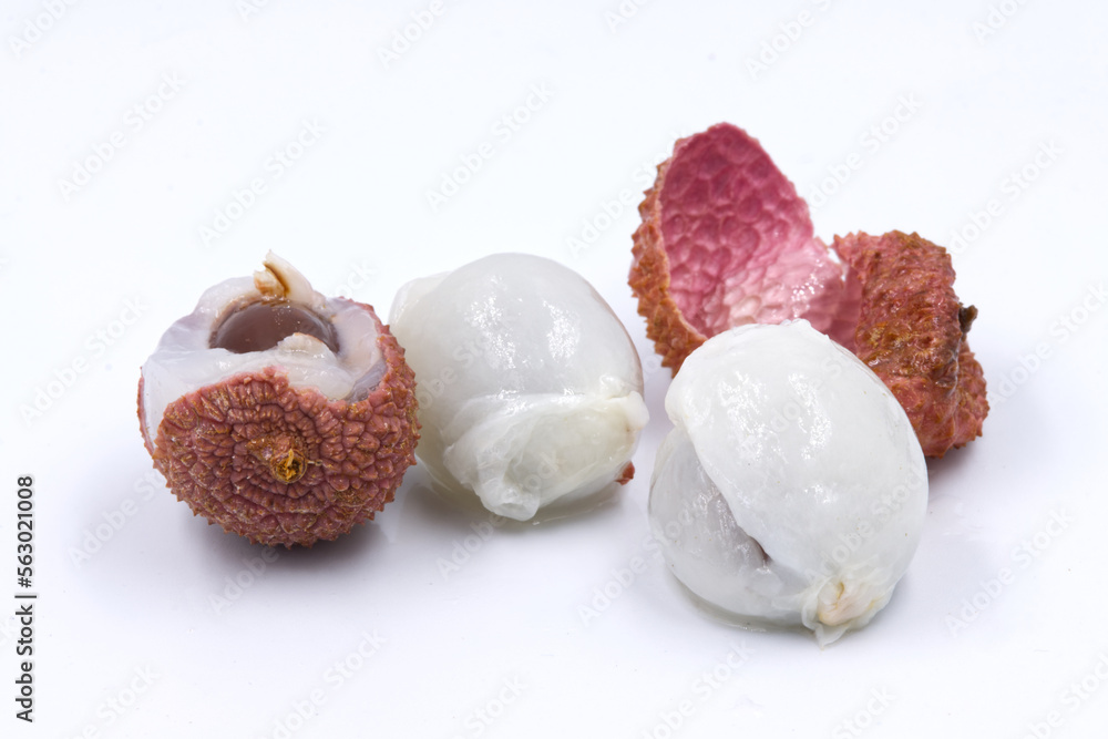Fresh ripe lychees on white background. Fresh ripe lychees on white background.