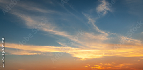 Beautiful bright sunset sky with clouds. Sunset sky background.