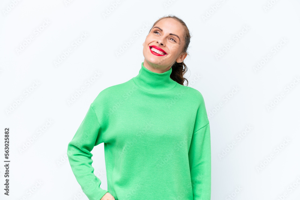 Young caucasian woman isolated on white background thinking an idea while looking up Young caucasian woman isolated on white background thinking an idea while looking up