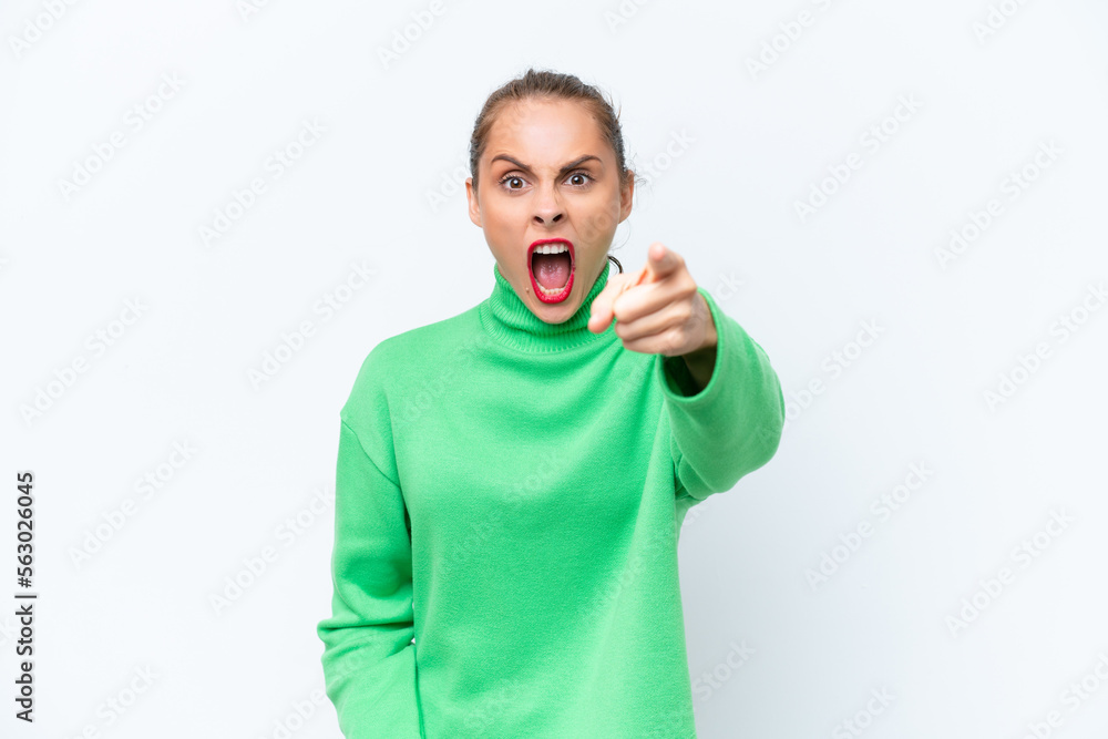 Young caucasian woman isolated on white background frustrated and pointing to the front Young caucasian woman isolated on white background frustrated and pointing to the front
