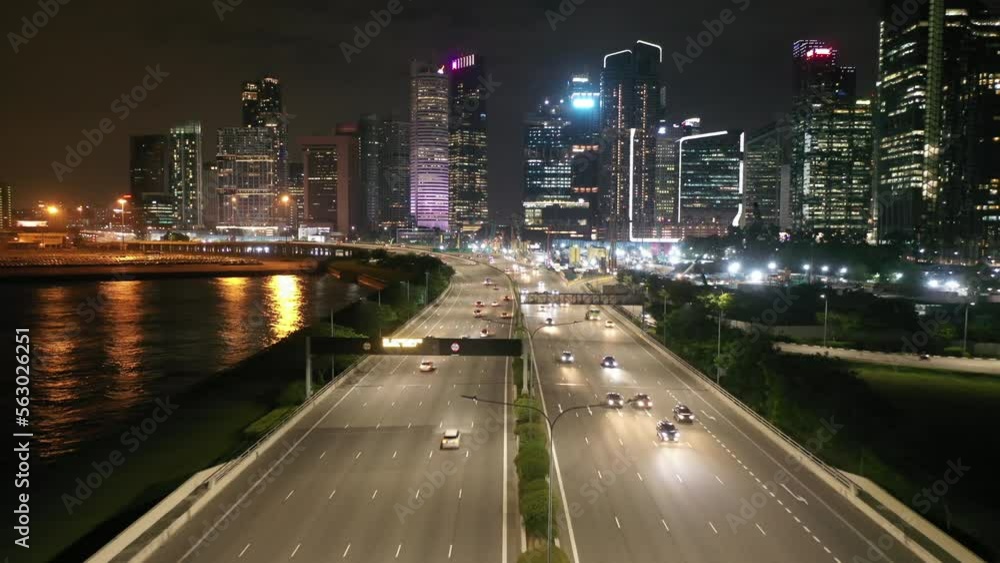 Aerial view of highway with car traffic and construction site, Singapore Aerial view of highway with car traffic and construction site, Singapore
