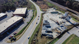 Ready-mixed concrete batching plant near strips mall highway in Flowery Branch, Georgia, USA