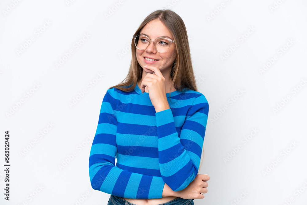 Young beautiful blonde woman isolated on white background looking to the side and smiling Young beautiful blonde woman isolated on white background looking to the side and smiling