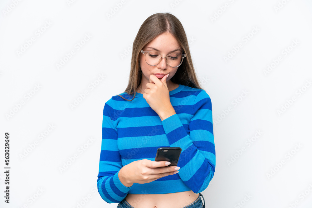 Young beautiful blonde woman isolated on white background thinking and sending a message Young beautiful blonde woman isolated on white background thinking and sending a message