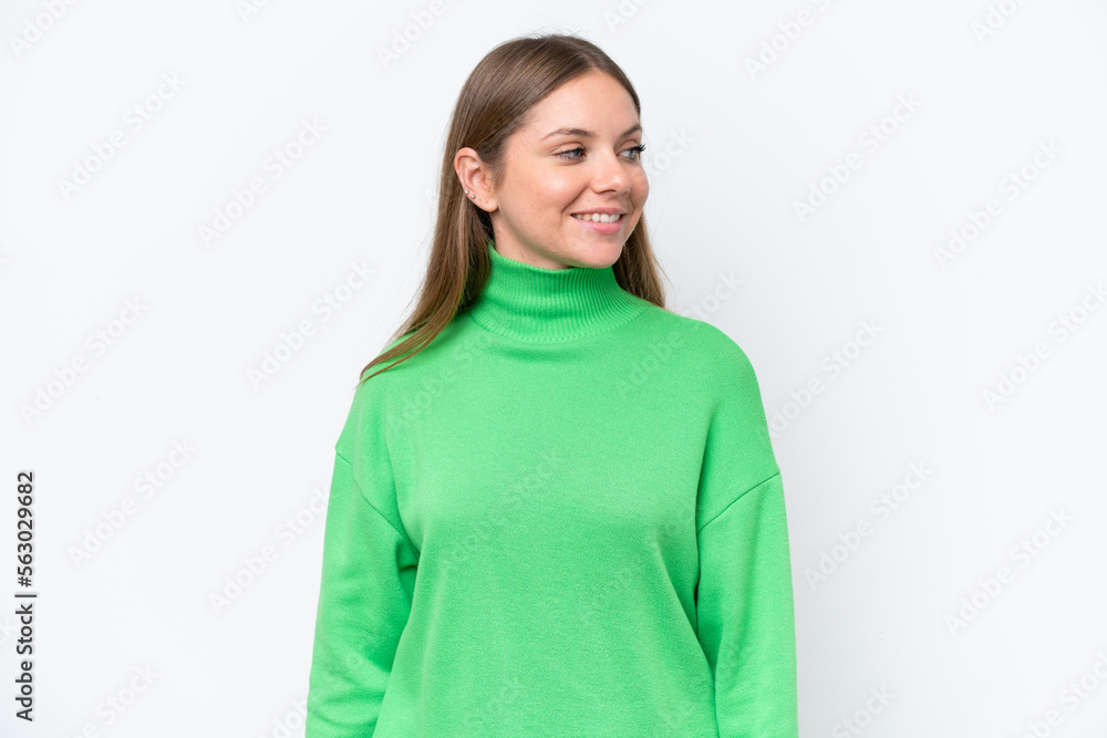 Young beautiful blonde woman isolated on white background looking to the side and smiling Young beautiful blonde woman isolated on white background looking to the side and smiling