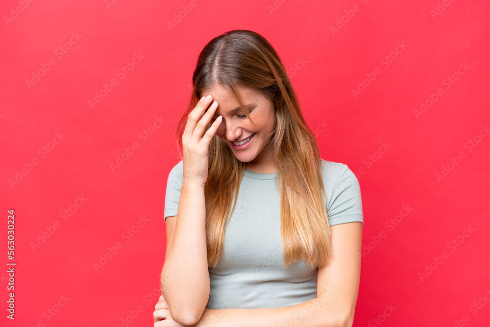 Young beautiful woman isolated on red background laughing Young beautiful woman isolated on red background laughing