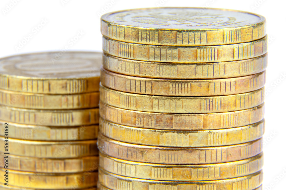 Gold coins isolated on a white background. Stacks of coins Gold coins isolated on a white background. Stacks of coins