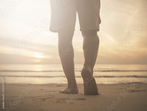 Man's footsteps on the beach 
