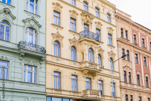 Facade of the house of classical European architecture of the old cozy tourist city. Background