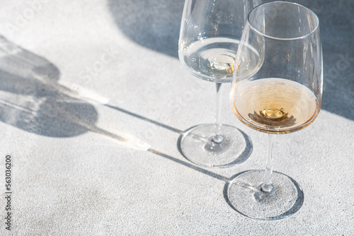 Glasses of white dry wine photo