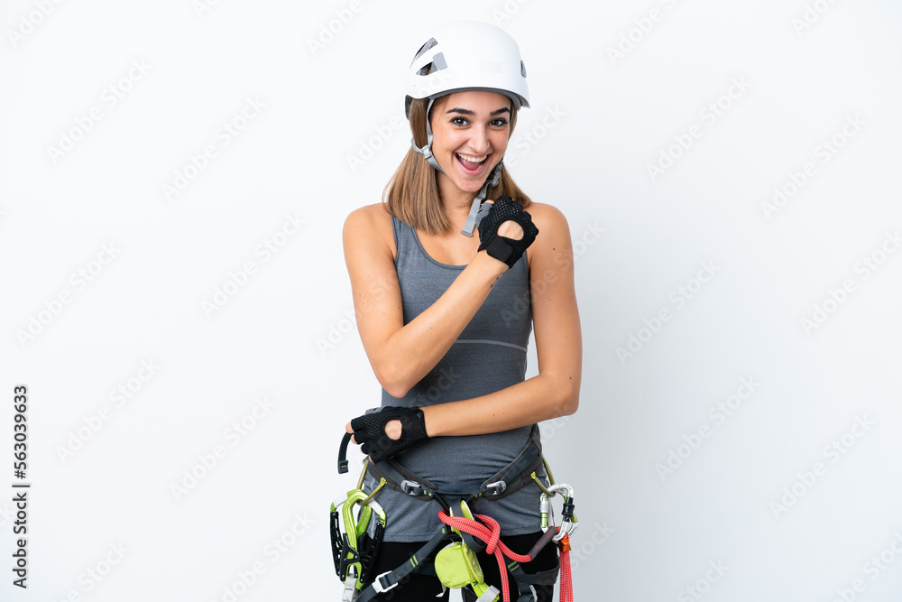 Young rock-climber woman isolated on white background celebrating a victory Young rock-climber woman isolated on white background celebrating a victory