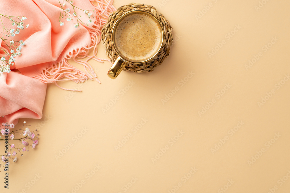 Hello spring concept. Top view photo of mug of frothy coffee on rattan placemat pink soft plaid and gypsophila flowers on isolated pastel beige background with blank space Hello spring concept. Top view photo of mug of frothy coffee on rattan placemat pink soft plaid and gypsophila flowers on isolated pastel beige background with blank space