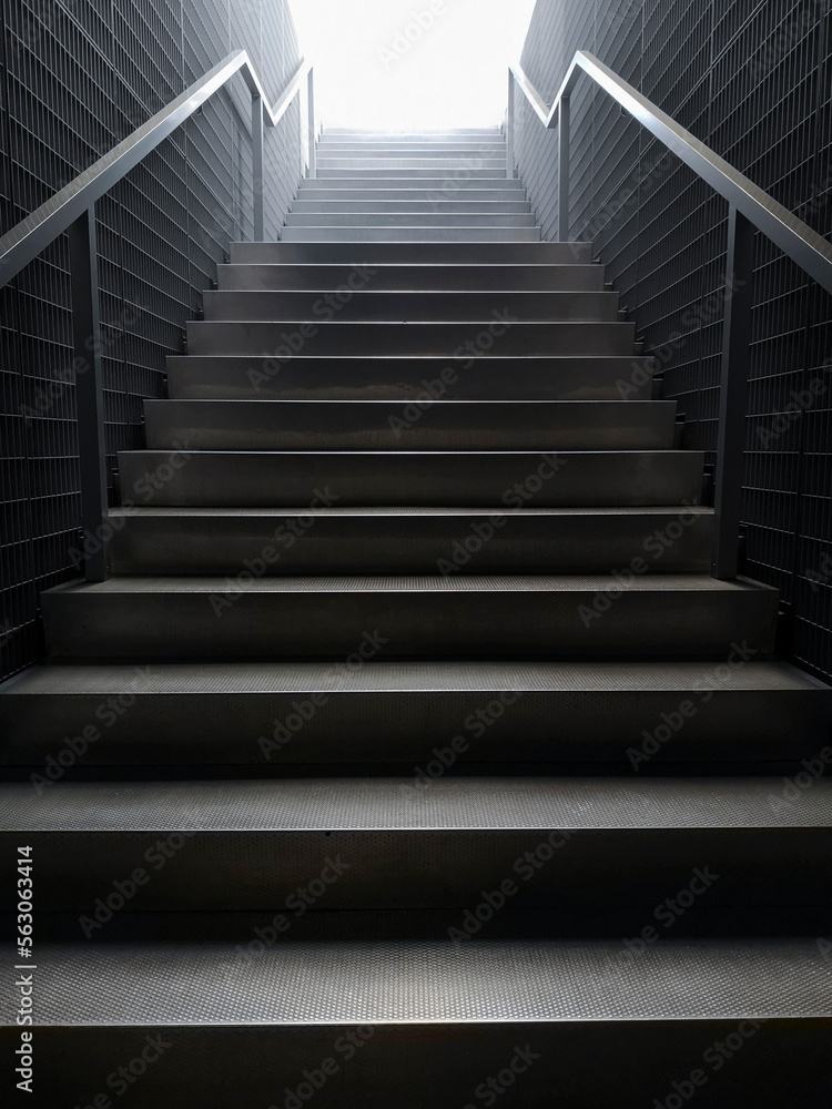 Fototapeta premium Empty stairway going up to infinity.