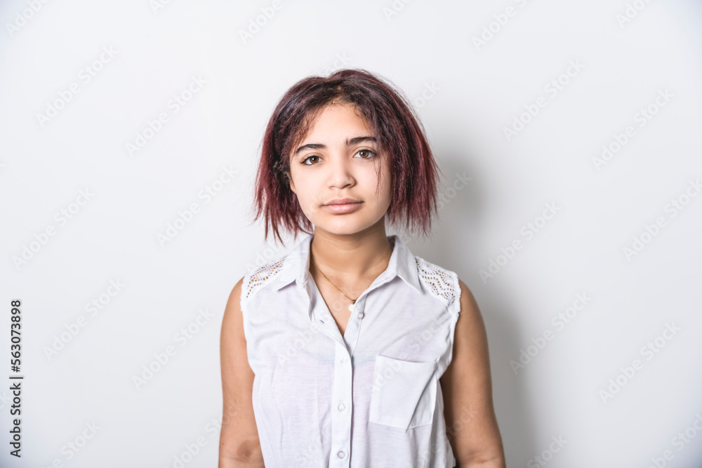 portrait of beautiful American teen over studio background portrait of beautiful American teen over studio background