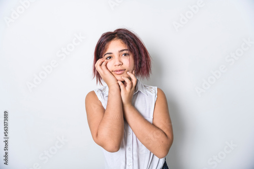 portrait of beautiful American teen over studio background