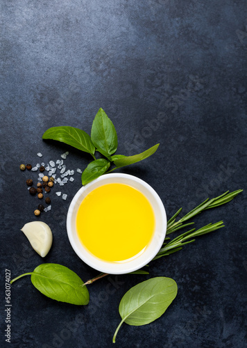 Food background from vegetable, spices, herb on black table