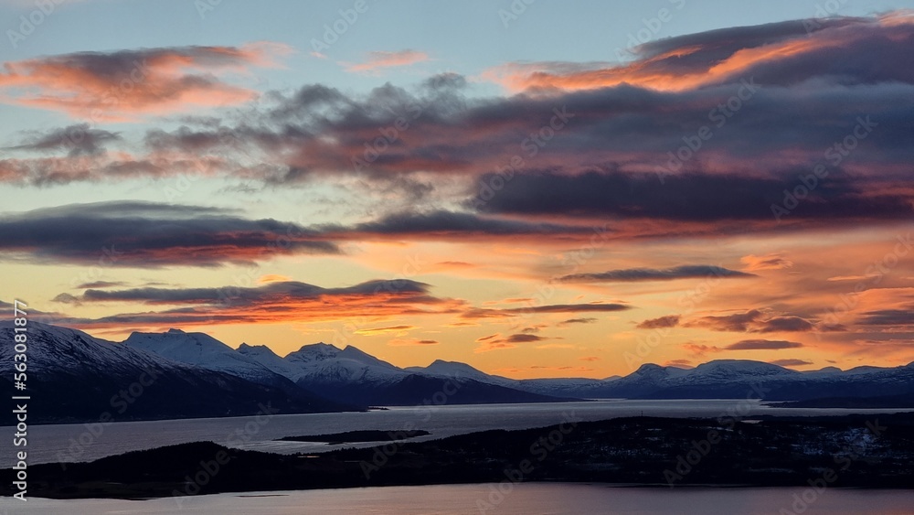 sunset in the mountains over the fjord, Tromsø, Norway