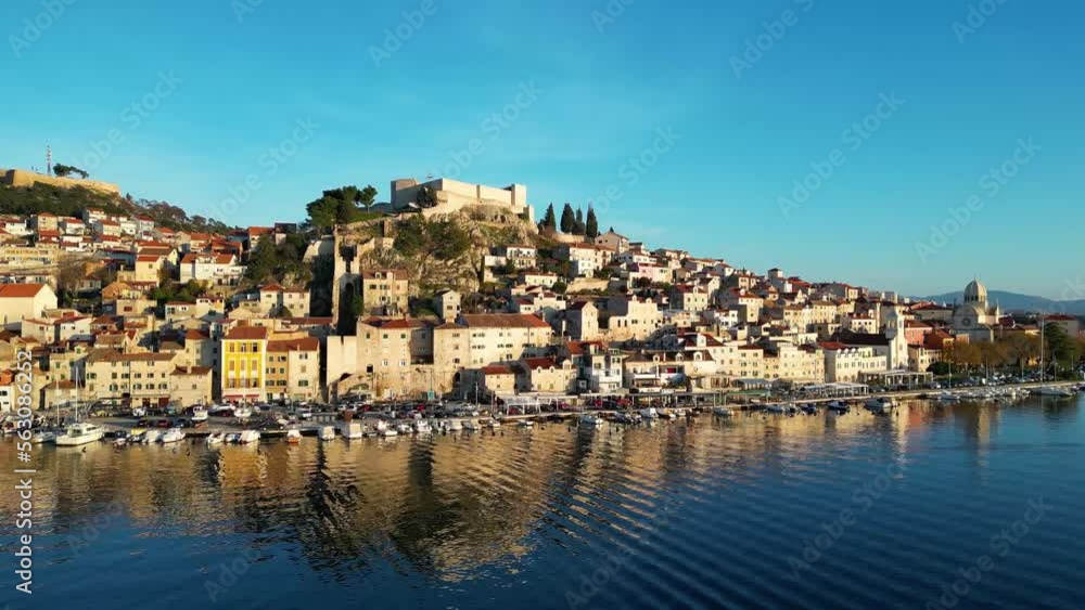 Aerial drone view of Sibenik town in Croatia during beautiful sunset colors. Vacations and holidays on the seacoast. The Cathedral of St James in Sibenik Unesco. Aerial drone view of Sibenik town in Croatia during beautiful sunset colors. Vacations and holidays on the seacoast. The Cathedral of St James in Sibenik Unesco.
