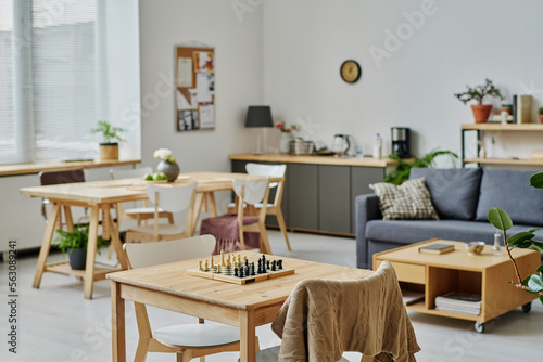 Horizontal image of modern room with sofa and table for board games in nursing house