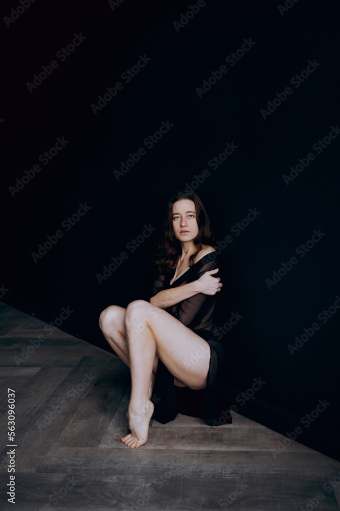 Beautiful, natural naked girl artistic posing at a stylish and fashionable nude photo shoot as a model in a photo studio with a transparent cape and bandage and looks like art Beautiful, natural naked girl artistic posing at a stylish and fashionable nude photo shoot as a model in a photo studio with a transparent cape and bandage and looks like art