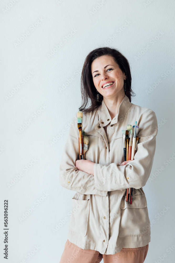 female artist with tassels standing on a white background female artist with tassels standing on a white background