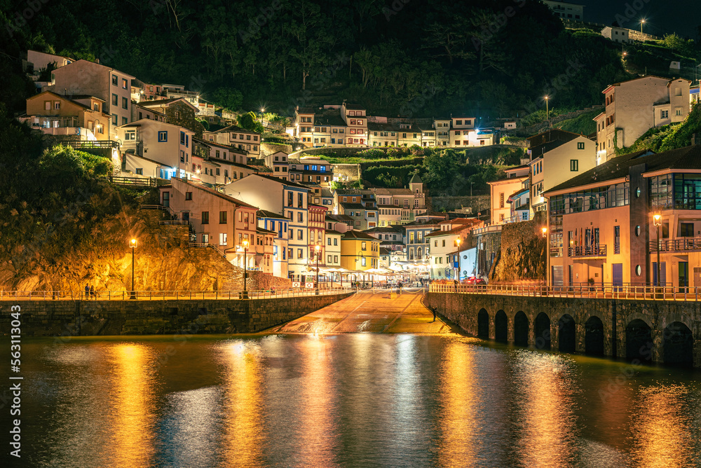 Naklejka premium Night photography in Cudillero on the Central Western Coast of Asturias, it is one of the most beautiful towns in Spain with unique beaches, green valleys, vertiginous cliffs.