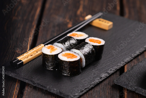 Maki sushi rolls with smoked salmon - Sushi menu. Japanese food concept