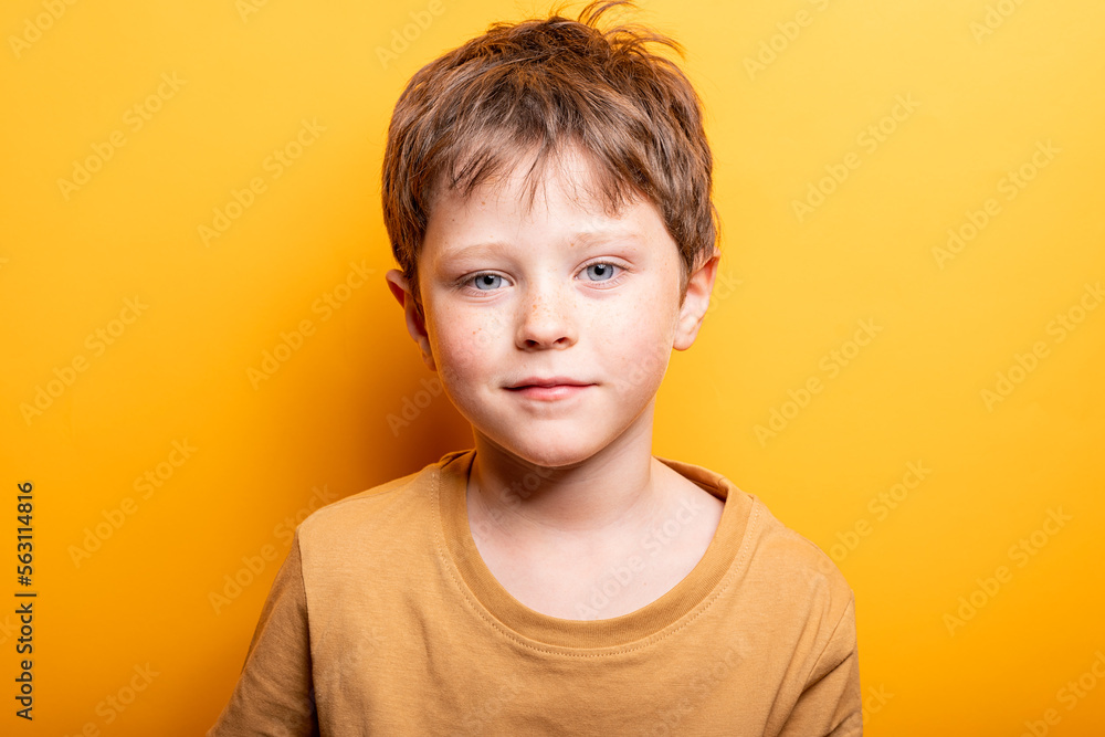 Elementary caucasian boy happy, looking at the camera Elementary caucasian boy happy, looking at the camera