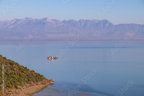 Panoramic view of ruins on Island Grmozur in Lake Skadar National Park in autumn seen from Godinje, Bar, Montenegro, Balkans, Europe. Travel destination in Dinaric Alps near the Albanian border photo