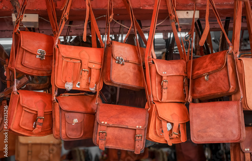 Several leather hand bags up for sale in street market , Jaipur, India.