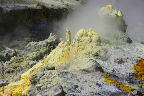 Closeup of a yellow sulphuric surface with crystels on the floor at a volcanic crater photo