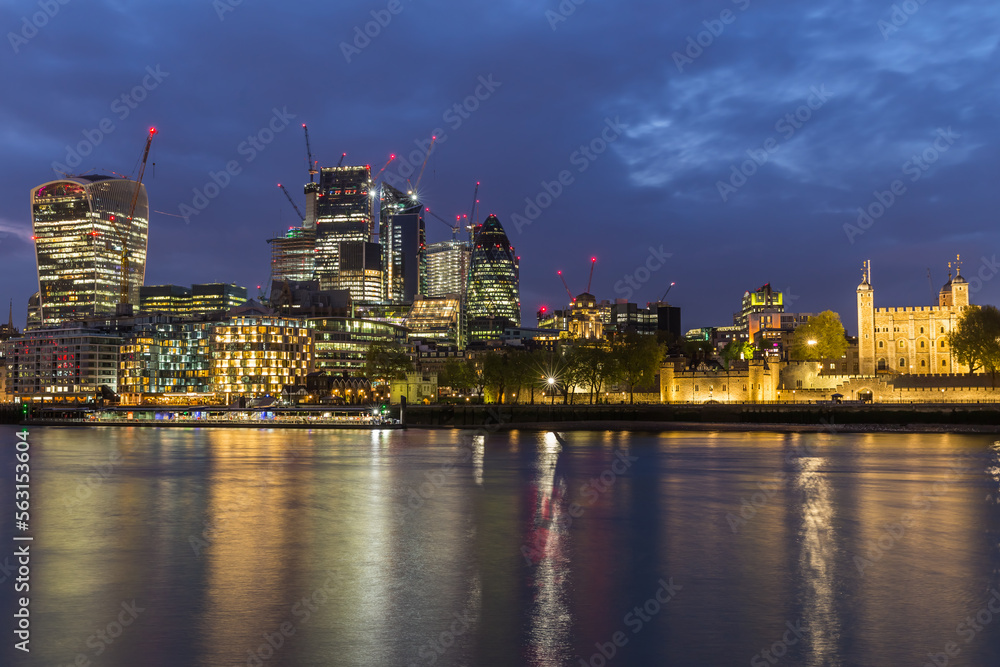 London's business district at night over the Thames