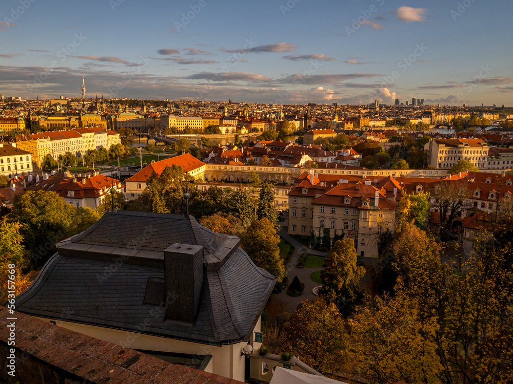 View of Prague. View from the gardens and vineyards of Prague Castle to picturesque Prague in the autumn setting sun. Prague, Czech Republic