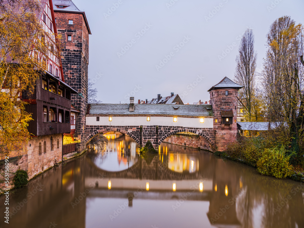 Long exposure shot od the Weinstadl, wasserturm water tower and Henkerbrücke on the River Pegnitz, Nuremberg, Germany