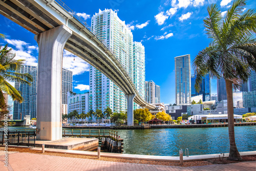 Miami downtown skyline and futuristic mover train above Miami river view © xbrchx