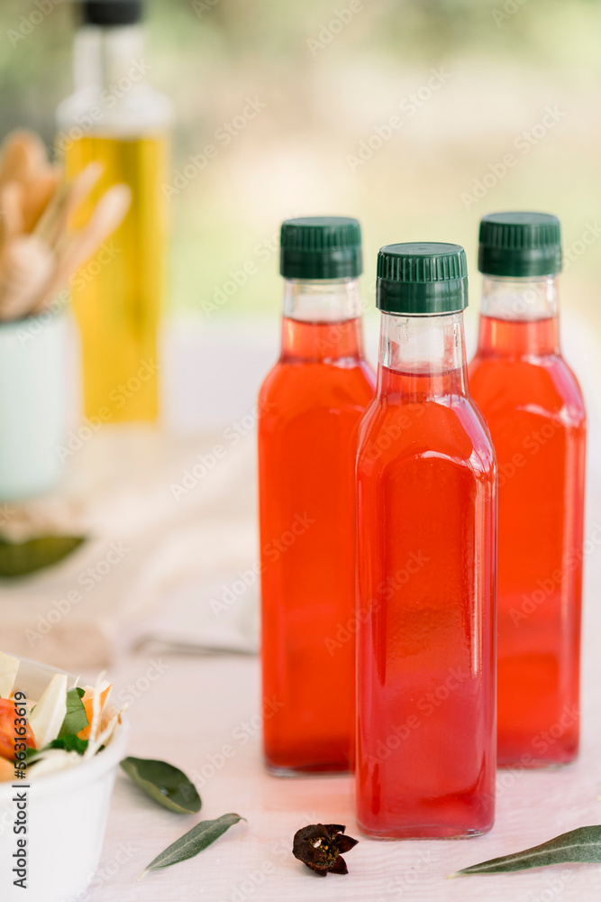 various salad vinegars in glass bottles. Front and top view. apple, lemon, strawberry, quince, grape, melon, apricot, tangerine, orange, grapefruit, various salad vinegars in glass bottles. Front and top view. apple, lemon, strawberry, quince, grape, melon, apricot, tangerine, orange, grapefruit,