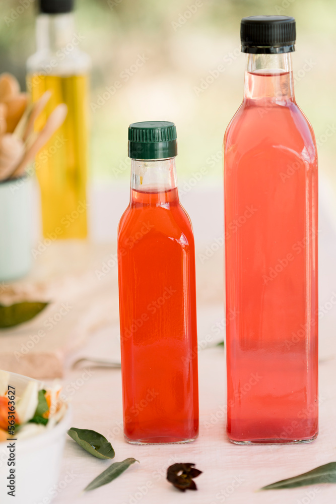 various salad vinegars in glass bottles. Front and top view. apple, lemon, strawberry, quince, grape, melon, apricot, tangerine, orange, grapefruit, various salad vinegars in glass bottles. Front and top view. apple, lemon, strawberry, quince, grape, melon, apricot, tangerine, orange, grapefruit,