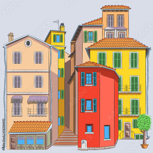 Old traditional street with colorful houses in the historic part of Menton.
