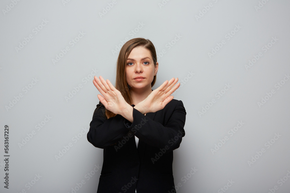 Young business woman gesturing stop with crossed hands Isolated portrait. Young business woman gesturing stop with crossed hands Isolated portrait.