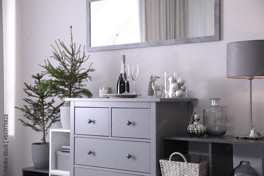 Fototapeta premium Beautiful room interior decorated for Christmas with potted firs