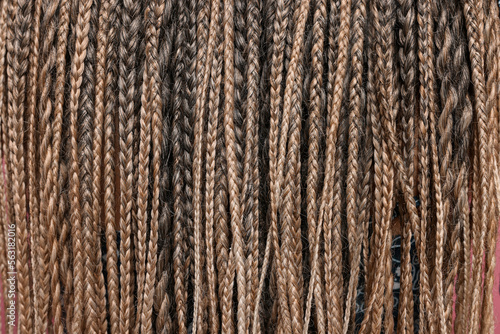 Many african braids as background, closeup view