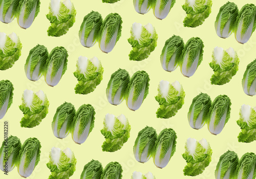 Pattern design with fresh Chinese cabbages on pale light yellow background