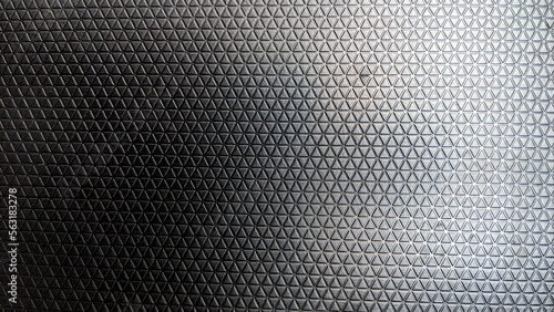 black plastic triangle texture for background