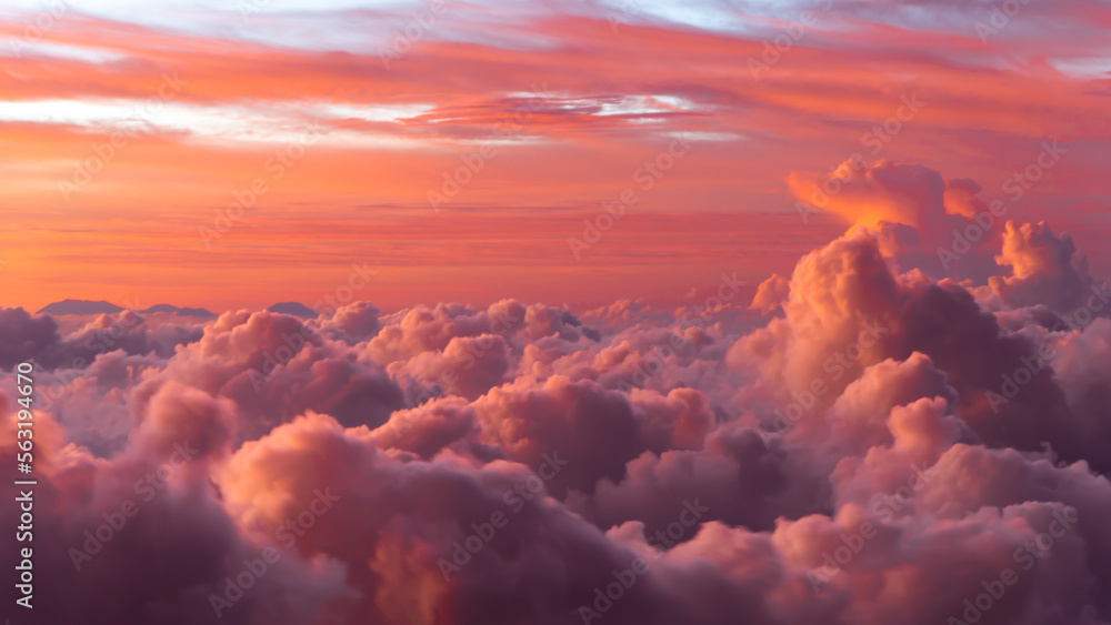 Beautiful sunset sky above the clouds with dramatic light. Shooting from the top of the Agung volcano Beautiful sunset sky above the clouds with dramatic light. Shooting from the top of the Agung volcano