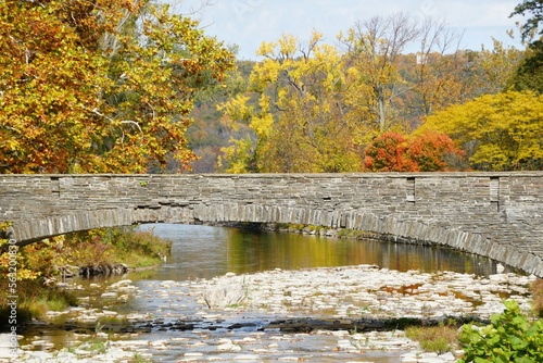 A bridge above the creek into Cayuga Lake at Taughannock Falls State Park, Upstate New York photo
