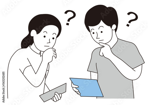 資料を見て考えている男女の医療従事者