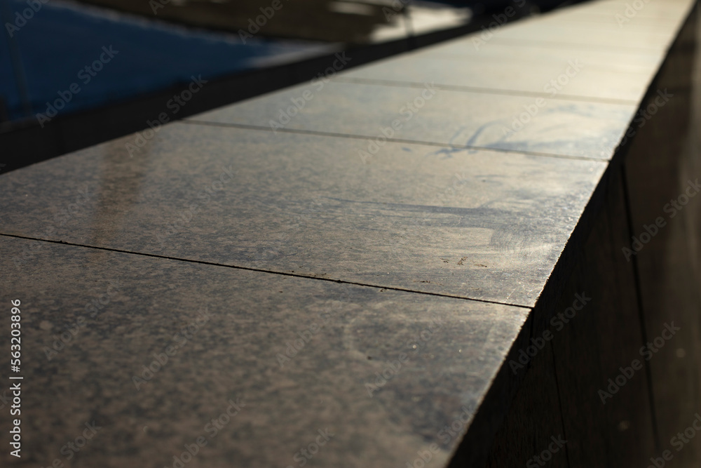 Obraz premium Granite tiles. Facade cladding. Details of building.