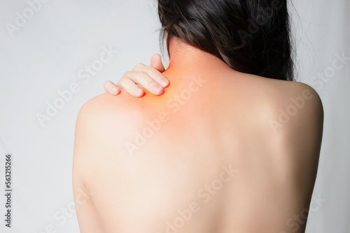 Quadro su tela Asian woman has problem, neck and back pain and massaged neck and shoulder for relief and reduce muscle tension